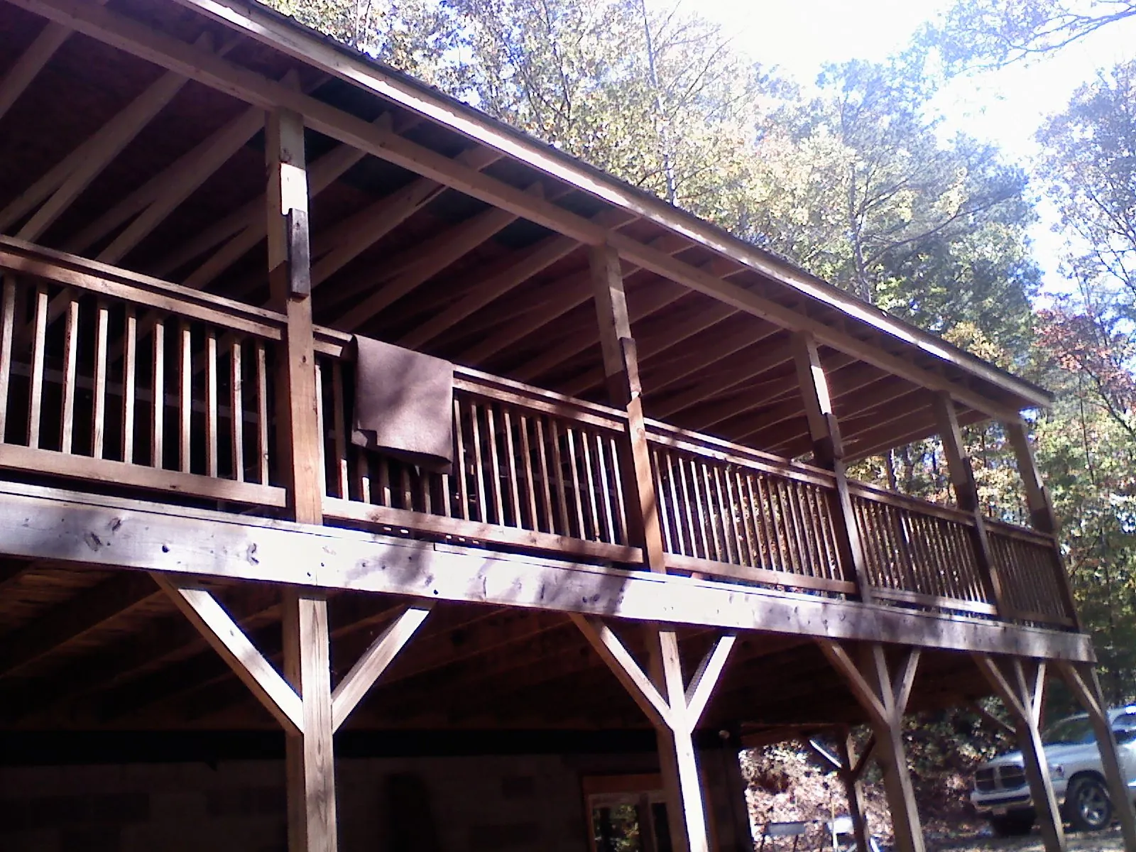 Timber framing under a new elevated porch and deck — Roof Leak Repair in Sublimity by Roofing Brothers